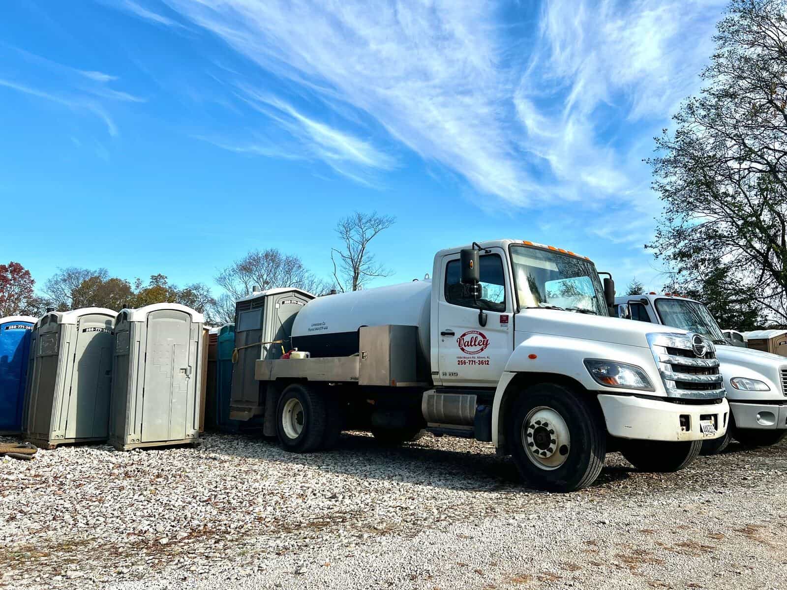 Valley Portable Restrooms service trucks and units at the Tanner, Alabama yard