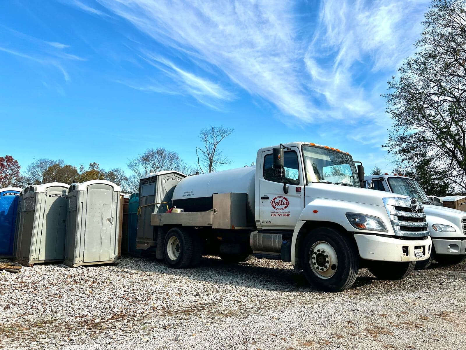 Valley Portable Restrooms service trucks and units at the Tanner, Alabama yard